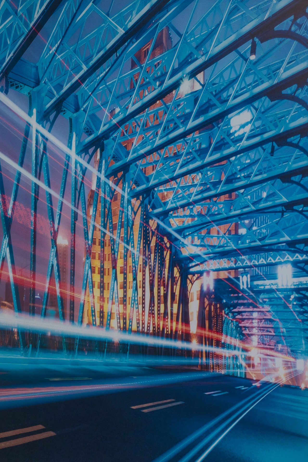 City bridge at night, representing ALFA Group's connections